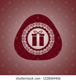gift box icon inside red icon or emblem