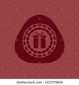 gift box icon inside retro red emblem