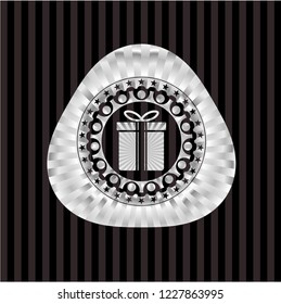 gift box icon inside silver shiny badge