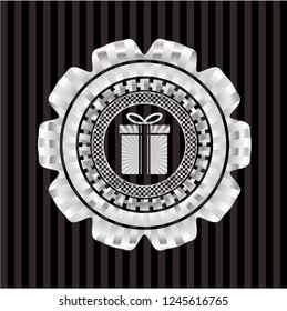 gift box icon inside silver emblem or badge