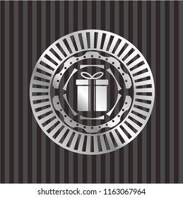 gift box icon inside silvery emblem or badge