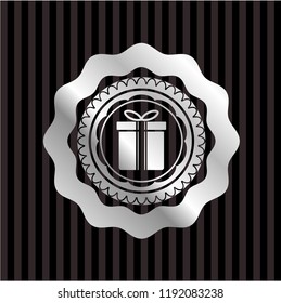 gift box icon inside silvery badge