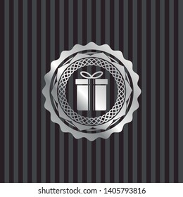 gift box icon inside silvery shiny badge