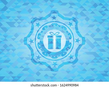 gift box icon inside sky blue emblem with mosaic ecological style background