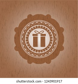 gift box icon inside wood emblem