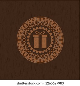 gift box icon inside wood emblem. Retro