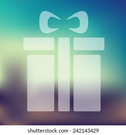 gift box icon on blurred background