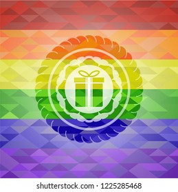 gift box icon on mosaic background with the colors of the LGBT flag