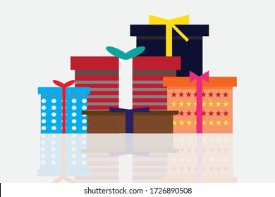 Caja de regalo en muchos colores. Sobre un fondo blanco