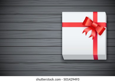 Gift box on black wooden table. Top view. Winter Holiday xmas background and backdrop. Fairy style. Vector Illustration.