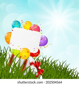 Gift box on green grass