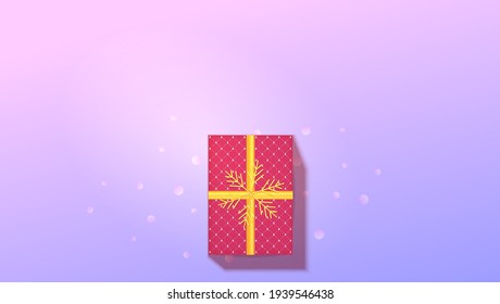 Caja de regalo sobre fondo de degradado moderno. Vista de la parte superior a papel envuelto en caja con estampado navideño festivo y copo de nieve dorado. Fondo vectorial.