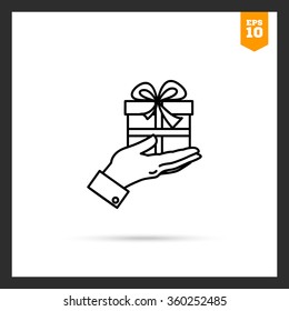 Gift box on palm