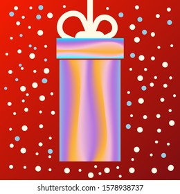 A gift box on a red background with a picture of snow in the background