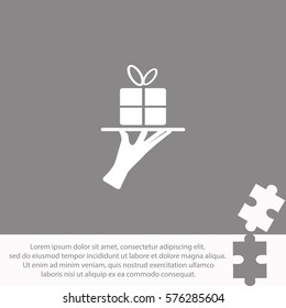 Gift box on a tray  icon Vector design.