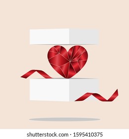 Gift box open with beautiful red ribbon and red heart. gifts and candles. The concept of valentine Day.