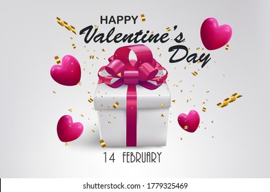 Gift box with pink bow and heart for valentines day