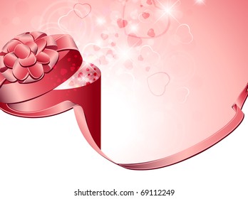 gift box with pink bow over holiday background with hearts,copyspace