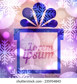 Gift box with place for text in the purple background with macro bokeh lights and snowflake. Perfect template for posters, websites, magazines, brochures, catalogs