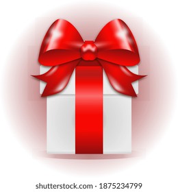 Caja de regalo con arco rojo en el fondo 