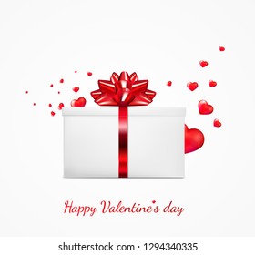 Gift box with red ribbon and bow. Happy Valentine's day greeting card.