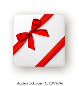 Gift box with red ribbon and bow, top view. Christmas, New Year party, Happy birthday or Valentine day package design. Realistic present isolated on white background. Vector.