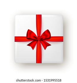 Gift box with red ribbon and bow, top view. Christmas, New Year party, Happy birthday or Valentine day package design. Realistic present isolated on white background. Vector.
