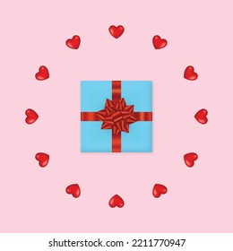 Gift box with red ribbon bow and heart on pink background. Greeting card.