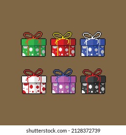 conjunto de cuadros de regalo con diferentes colores y puntos de polka en el estilo de píxeles
