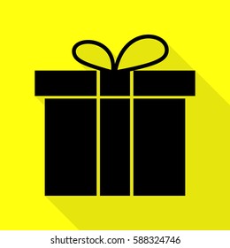 Gift box sign. Black icon with flat style shadow path on yellow background.