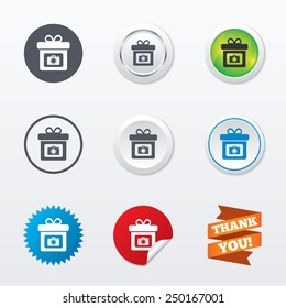 Gift box sign icon. Present with photo camera symbol. Circle concept buttons. Metal edging. Star and label sticker. Vector