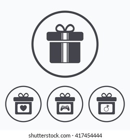 Gift box sign icons. Present with bow and ribbons symbols. Engagement ring sign. Video game joystick. Icons in circles.