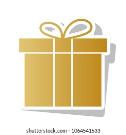 Gift box sign. Vector. Golden gradient icon with white contour and rotated gray shadow at white background.
