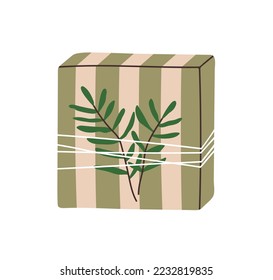 Gift box in striped wrapping with twine, string and leaf branch. Holiday present in paper package, festive surprise with rustic decoration. Flat vector illustration isolated on white background