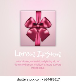 Gift box top view Realistic gift box with a satin pink bow in top view on light-pink background with space for inscription