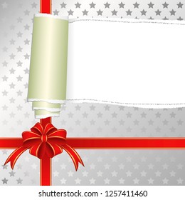 gift box with torn wrapping paper and bow
