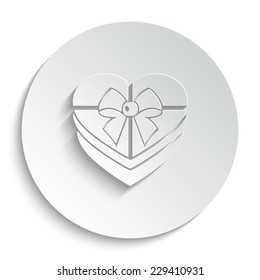 Gift box  - vector icon with shadow on a round button