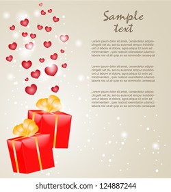 Gift boxes with gold ribbons and hearts