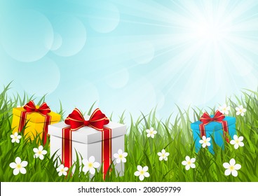Gift boxes on green grass