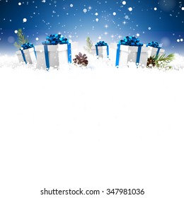 Gift boxes in the snow at night - Christmas greeting card with empty space for your text