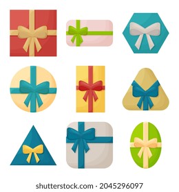 Gift boxes of various shapes and sizes with beautiful ribbons and bows, top view.