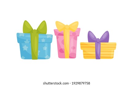 Gift Boxes Wrapped in Paper and Tied with Ribbon as Holiday Symbols Vector Set