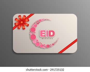 Gift card of Eid Mubarak with intricate calligraphy for the celebration of Muslim community festival.