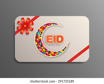 Gift card of Eid Mubarak with intricate calligraphy for the celebration of Muslim community festival.