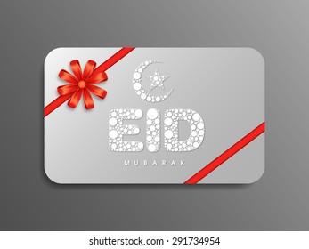 Gift card of Eid Mubarak with intricate calligraphy for the celebration of Muslim community festival.