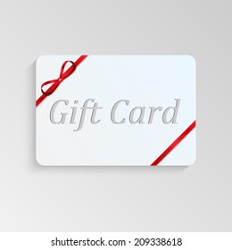 Gift card with a red bow