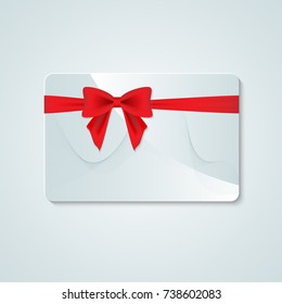  gift card with red ribbons and bow
