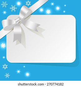 Gift Card with ribbon dark blue on turquoise background snowflakes