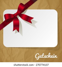 Gift Card with ribbon red on crumpled paper brown background