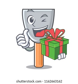 With gift cartoon putty knife in plaster